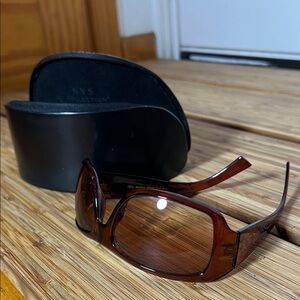 Brown frame/lenses woman’s sunglasses